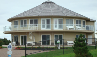 Illustration for article titled These Buildings Can Actually Move by Rotating